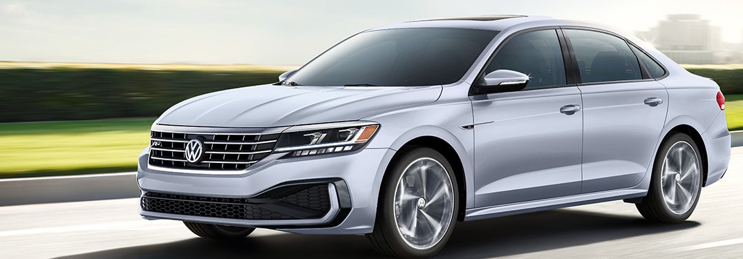 2020 Volkswagen Passat driving down a rural road
