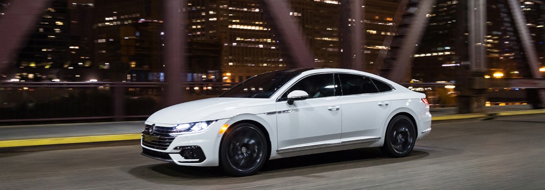 2020 Volkswagen Arteon driving down a bridge