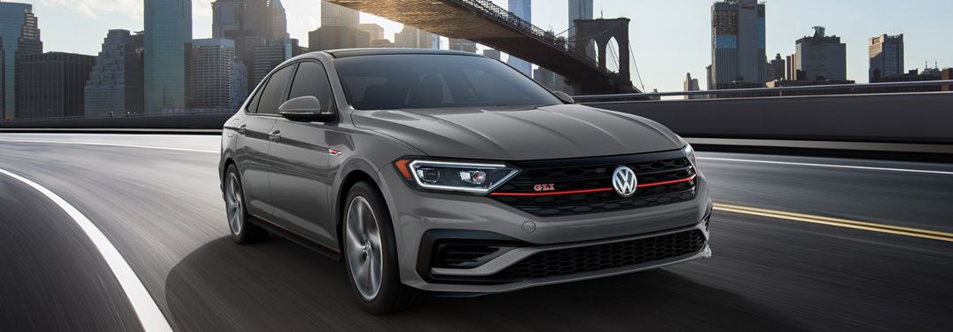 2020 Volkswagen Jetta GLI driving down a highway road