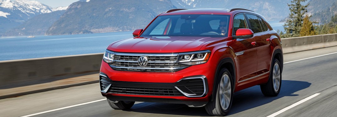 2021 Volkswagen Atlas Cross Sport driving down a street