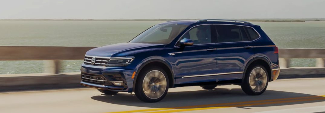 2021 Volkswagen Tiguan driving on a bridge