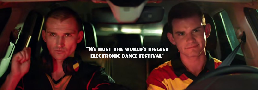 Men in Belgium Soccer Jerseys sitting in vehicle with quote about Belgium having the biggest electronic dance festival