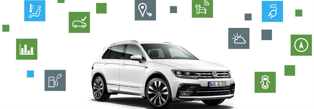 White Volkswagen Tiguan with Car-Net Feature icons