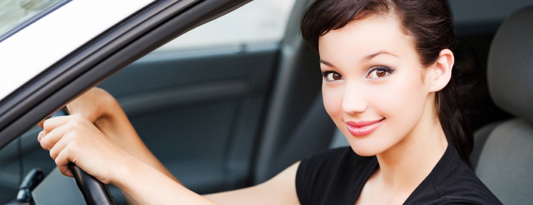 Girl wearing black shirt while driving