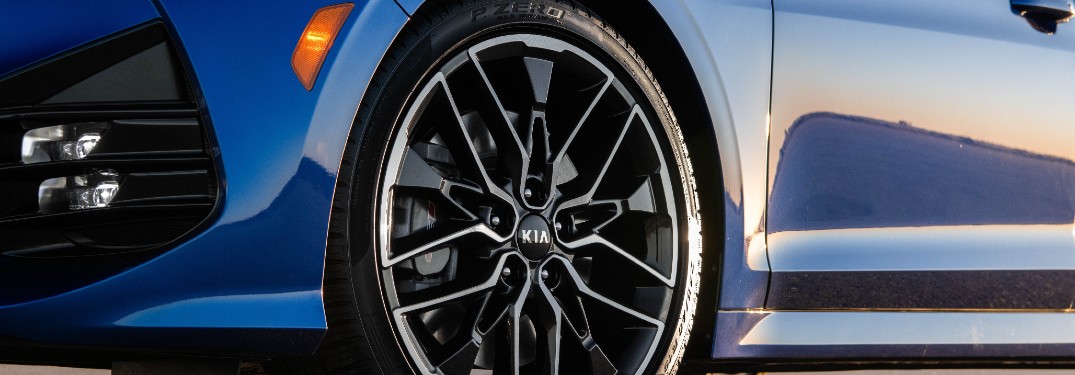 Wheel and tire on a blue 2021 Kia K5