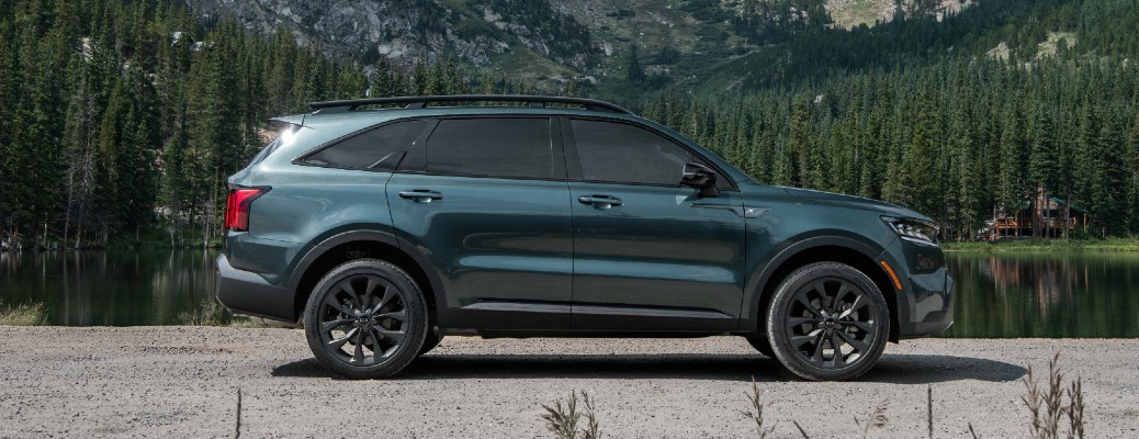Side view of dark teal 2021 Kia Sorento