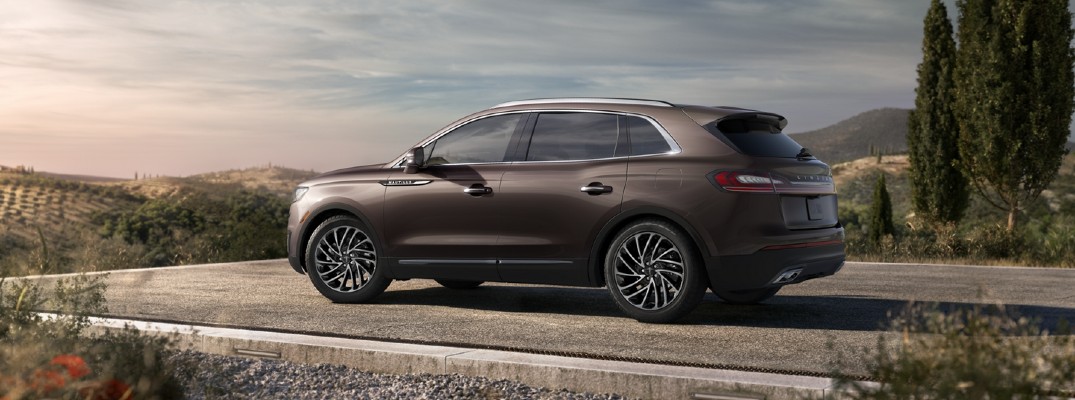 2020 Lincoln Nautilus Ochre Brown parked on platform facing countryside