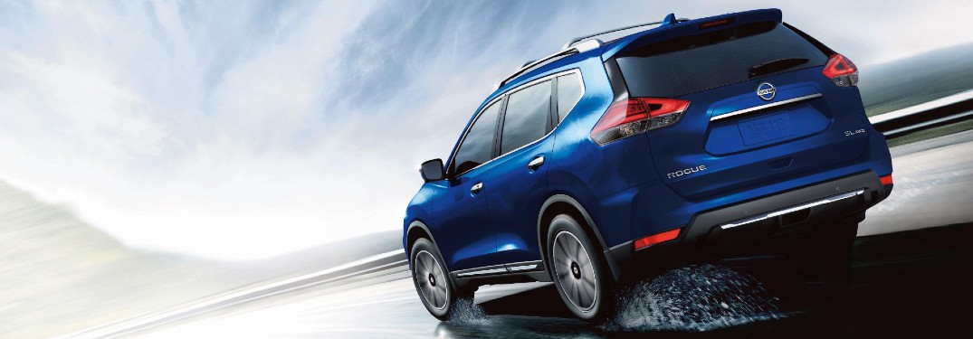 2020 Nissan Rogue Blue Driving away at an angle