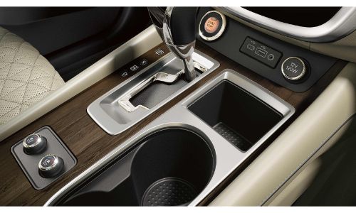 2020 Nissan Murano interior close up of shifter usb lighter slot and cupholders