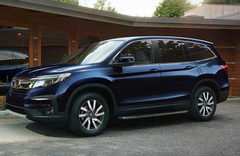 2020 Honda Pilot parked in front of a building