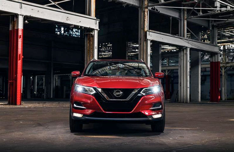 2020 Nissan Rogue Sport parked in front of a large building