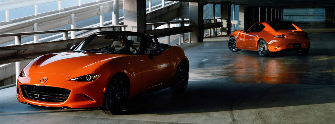 Two orange 2019 Mazda MX-5 Miata 30th Anniversary models