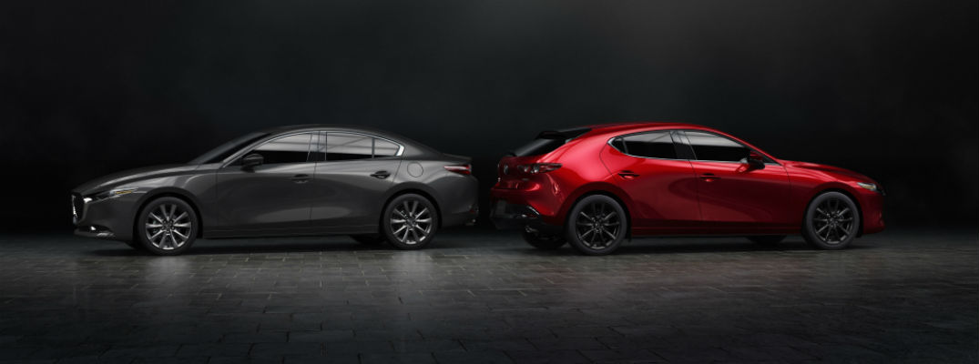 A side-by-side photo of the 2019 Mazda3 Sedan and 2019 Mazda3 Hatchback in a photo studio.