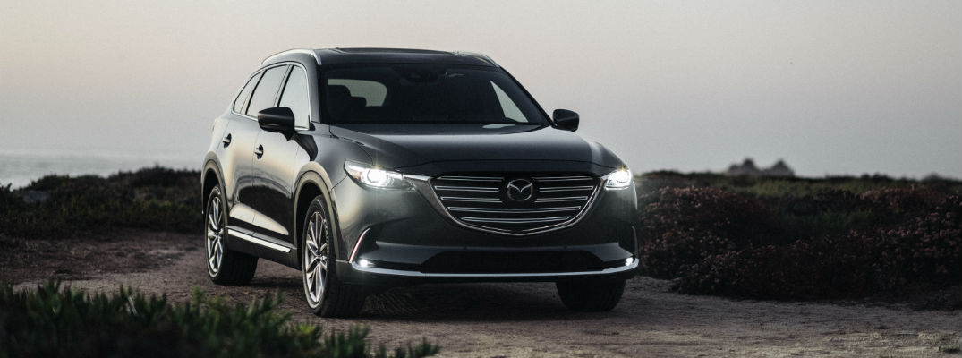 A photo of a 2020 Mazda CX-9 parked on a road.
