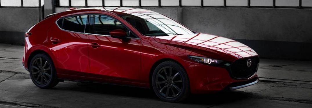Red 2020 Mazda3 Hatchback in a Garage