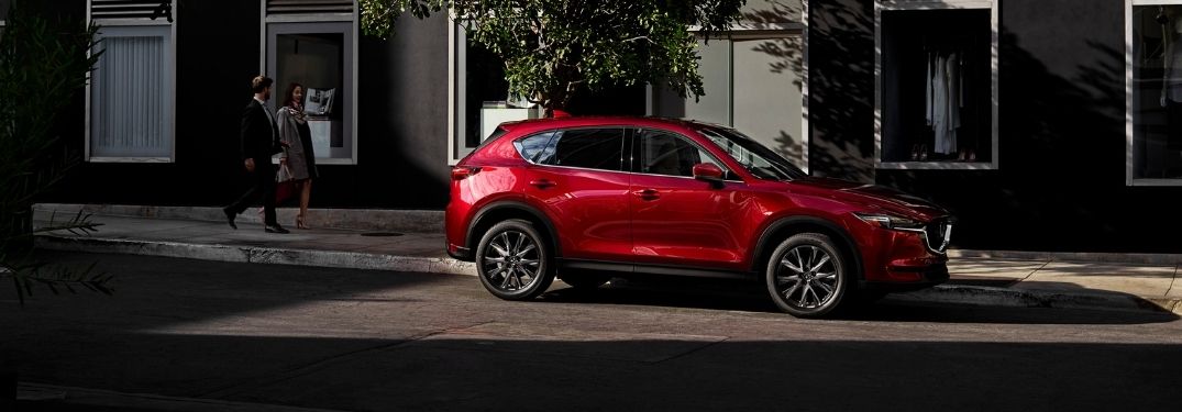 Red 2021 Mazda CX-5 Side Exterior on a City Street