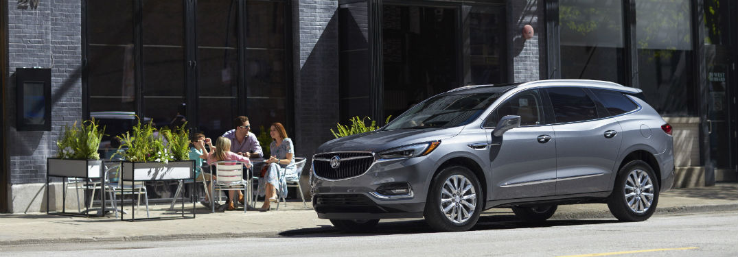 Driver's side exterior view of a gray 2018 Buick Enclave