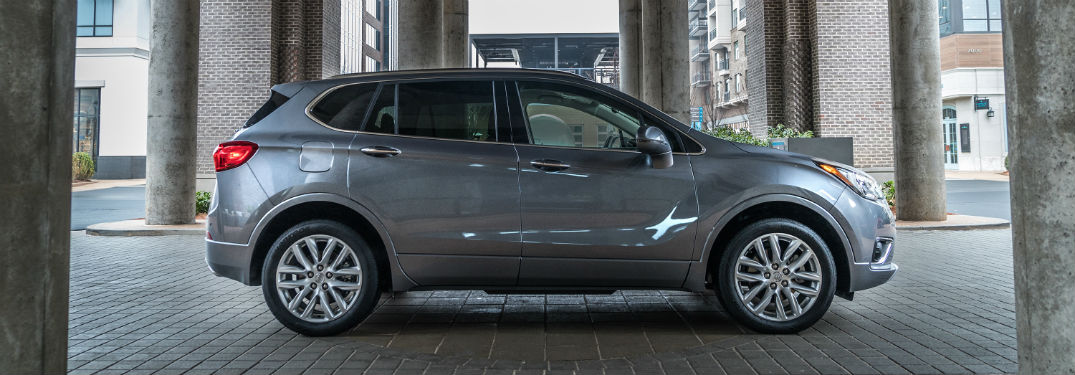 Passenger side exterior view of a gray 2019 Buick Envision