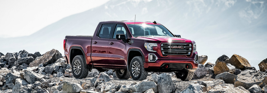 Red 2019 GMC Sierra 1500 AT4 parked on a rocky road