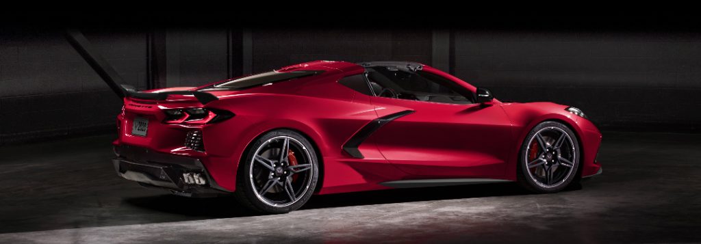 Passenger's side rear angle view of red 2020 Chevrolet Corvette Stingray