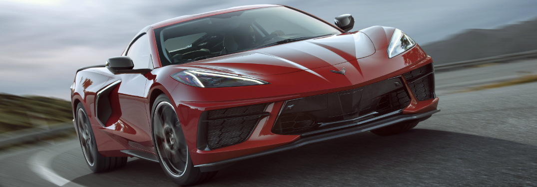 Red 2020 Chevrolet Corvette Stingray driving on a curvy road
