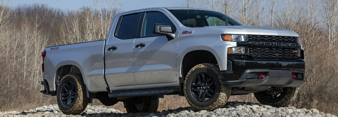 Silver 2020 Chevrolet Silverado 1500 parked on a pile of rocks