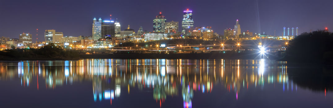 a city reflecting in alake