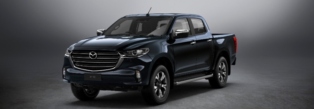 The front and side view of a black 2020 Mazda BT-50 pickup truck/