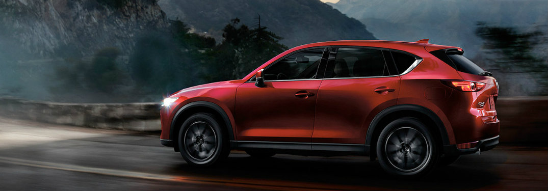 2018 Mazda CX-5 side exterior on road at night
