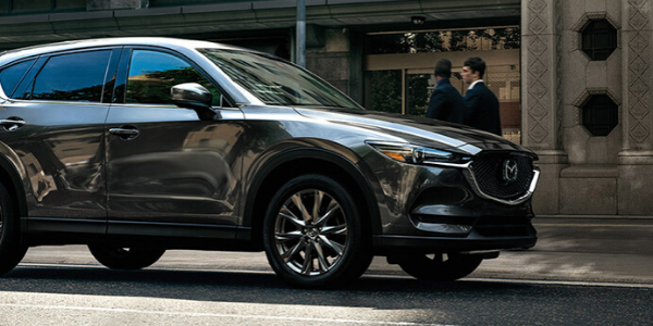 Side view of gray metallic 2020 Mazda CX-5