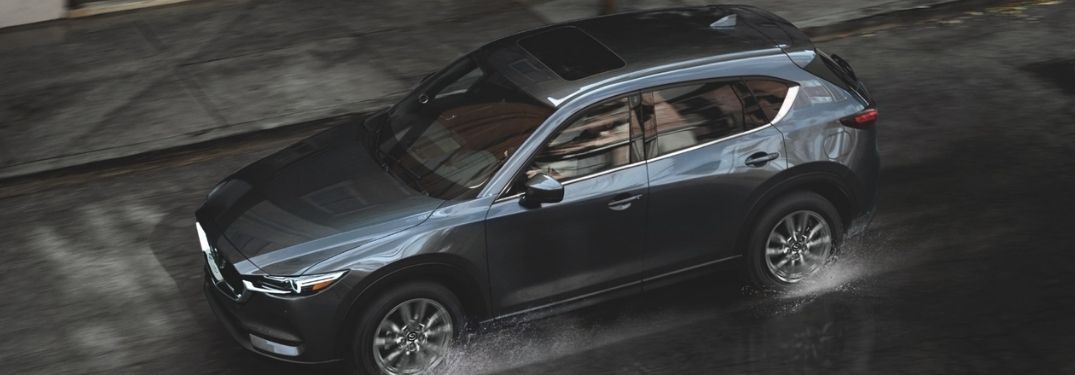Overhead View of Gray 2021 Mazda CX-5 Driving in the Rain