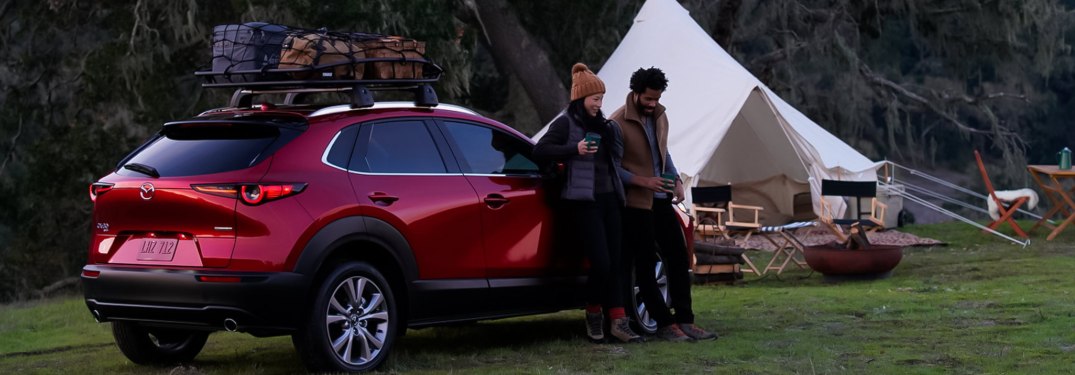 A couple camping with a 2021 Mazda CX-30