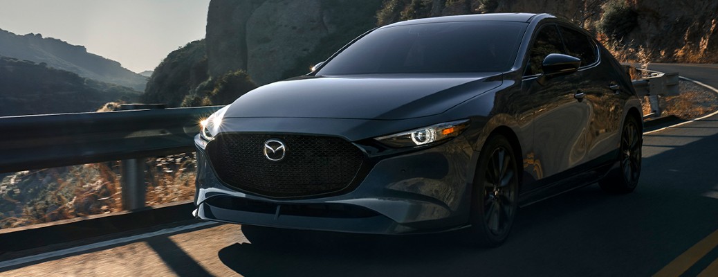 2021 Mazda3 Hatchback front view on a road