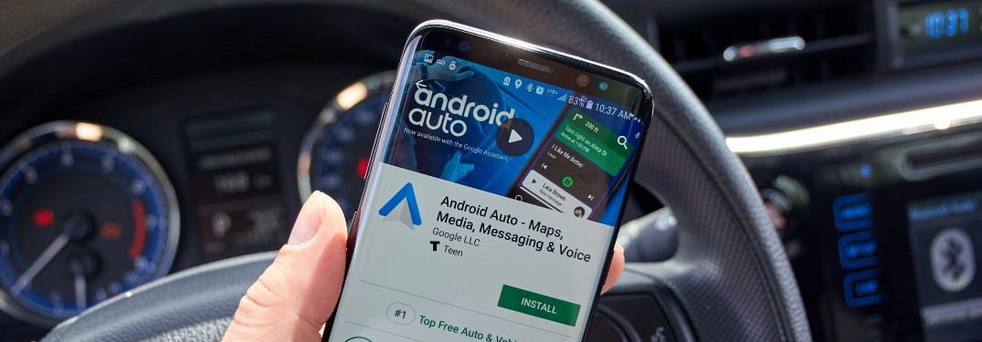 Close up of phone with Android Auto active in car