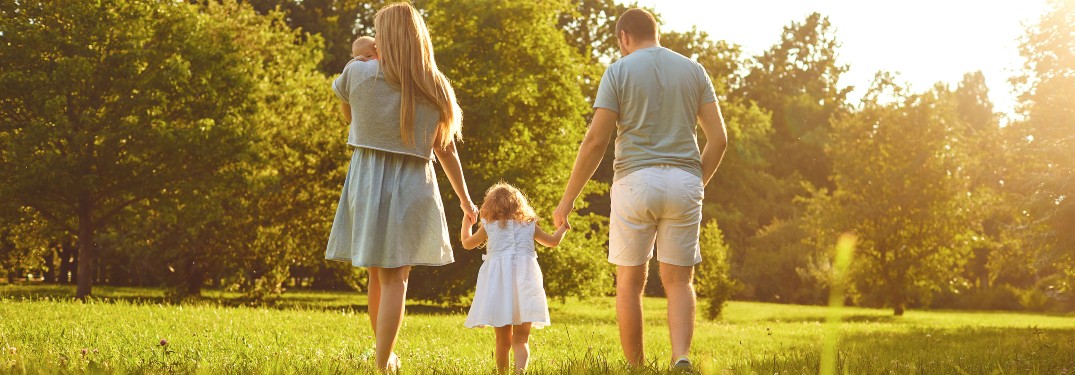 family walking in park