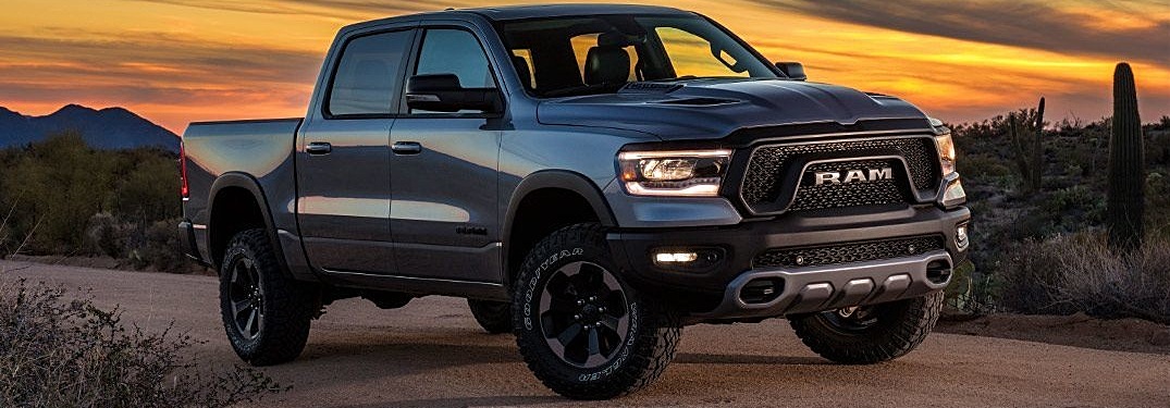2019 Ram 1500 side view in the desert at sunset