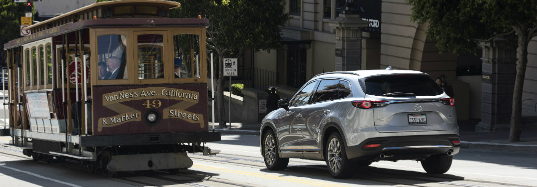 2016 Mazda CX-9 on road next to trolley