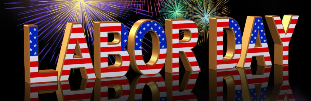 American flag block letters saying Labor Day with fireworks in the background