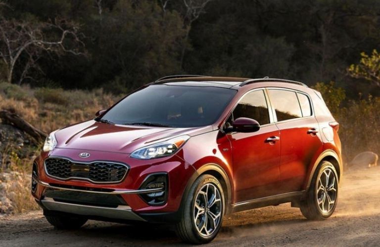 2020 Kia Sportage driving on dirt and sand