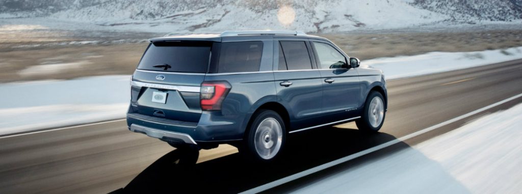 rear view of 2018 ford expedition driving