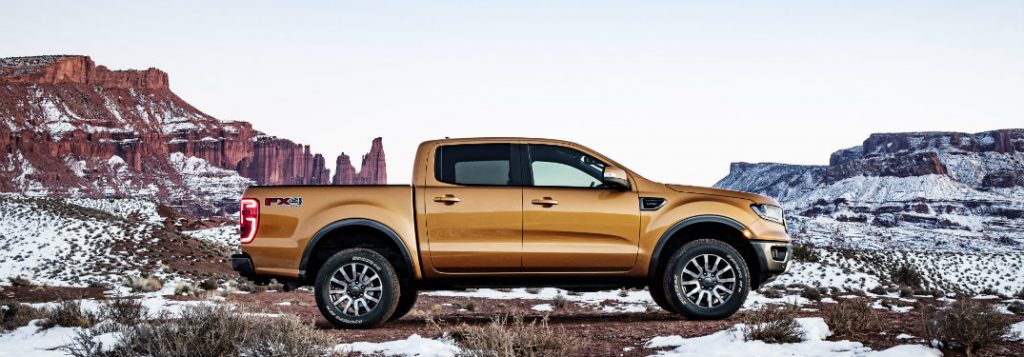 2019 ford ranger side view parked by mountain